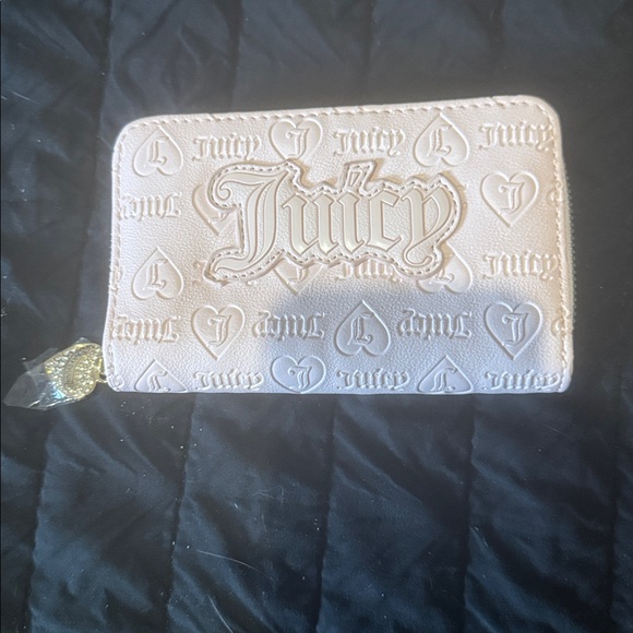 Juicy Couture Handbags - Juicy Couture Embossed Cream Wallet